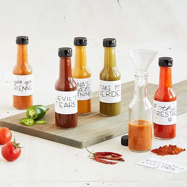Hot sauces with funnel to make your own