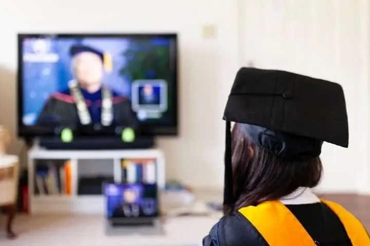 A graduate watching tv