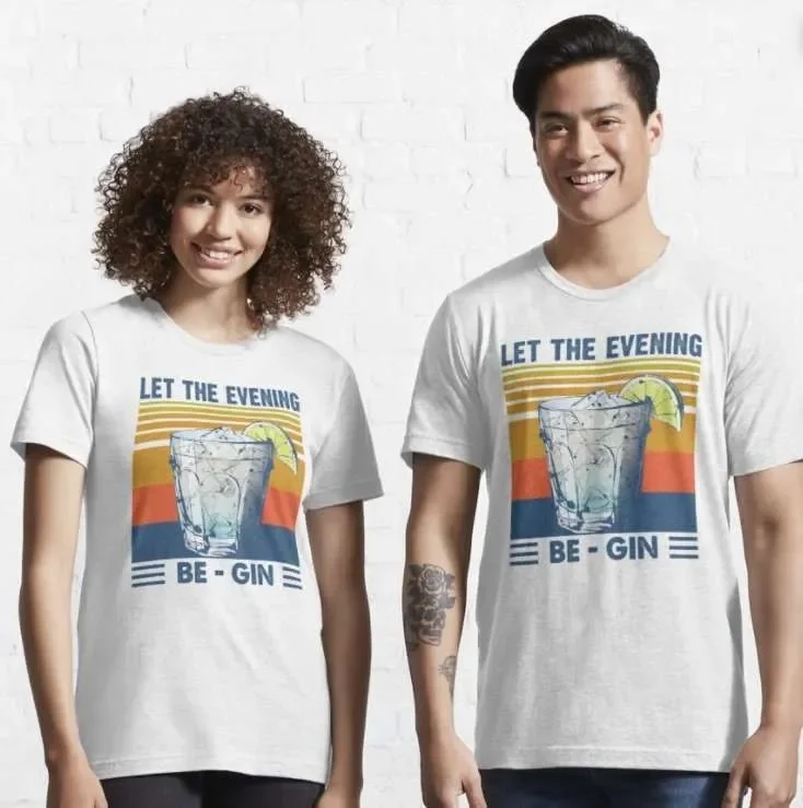 Two people wearing shirt with "let the evening be gin"