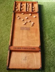A wooden sjoelbak game from The Netherlands