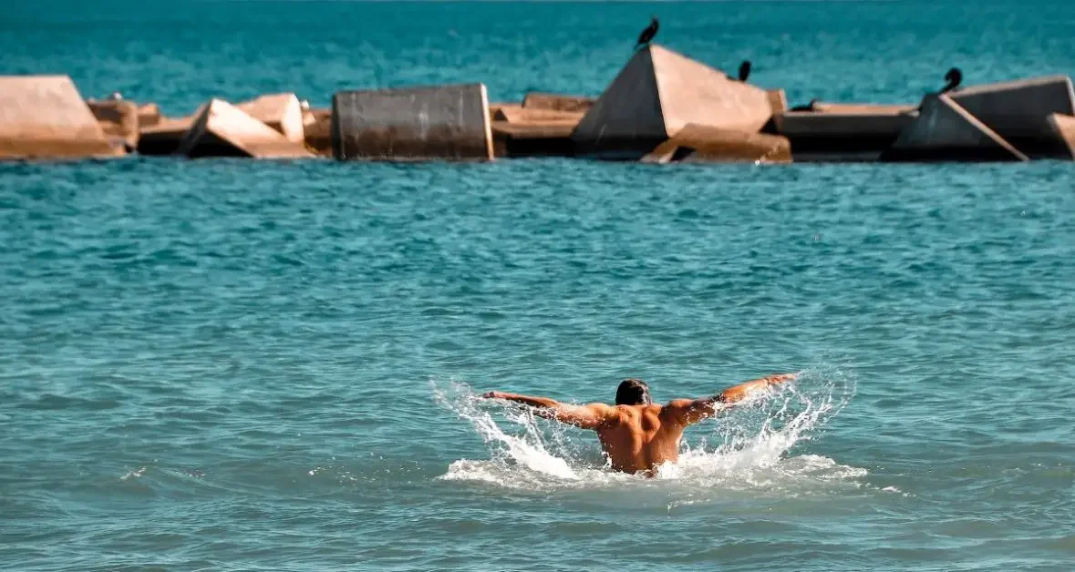 Man swimming in open water