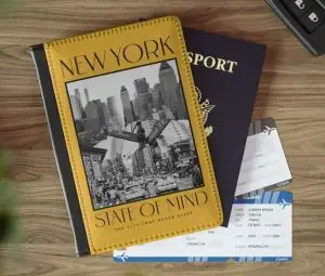 A passport cover with a photo of New York State