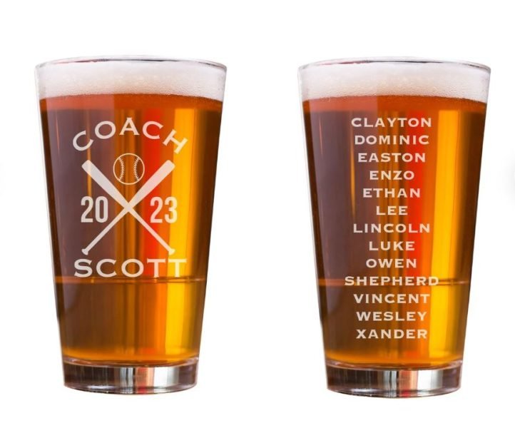 A personalized beer glass with "coach" and the team's players' names etched