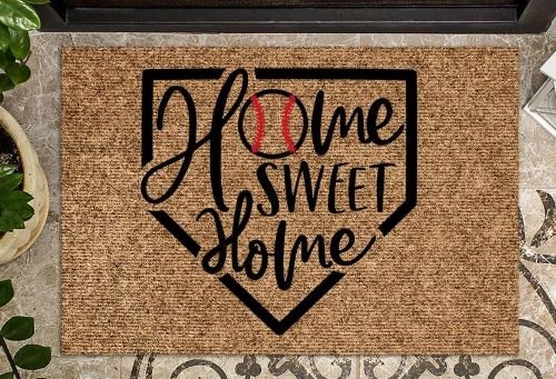 A doormat for baseball fans with the home sign
