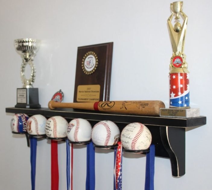 A medal display and ball holder for baseball players