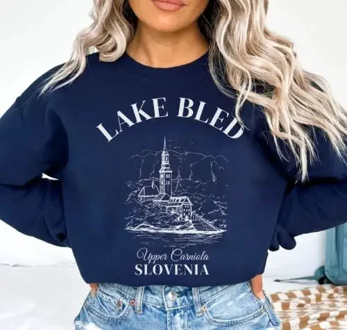 Women wearing a navy blue sweatshirt with "Lake Bled, Slovenia"