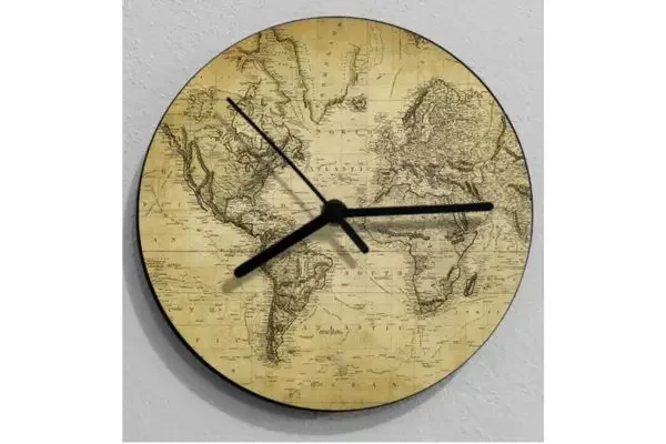 A wall clock with a vintage world map