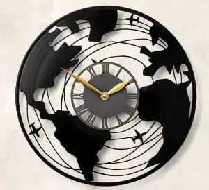 A clock with a world map made from an olf vinyl record