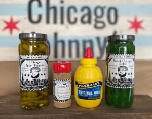 Four jar and cans of typical ingredients needed to make the Chicago hot dog