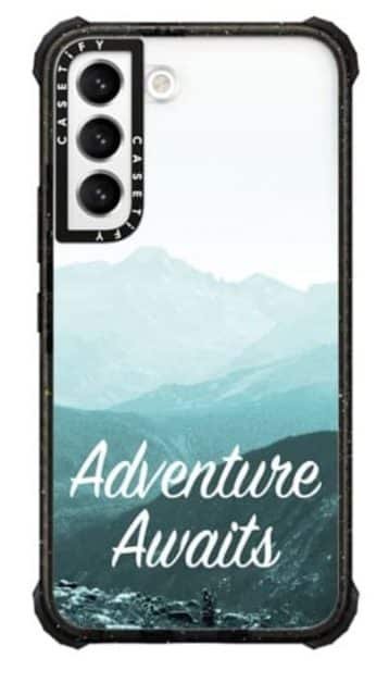 Phone case with "adventur awaits"