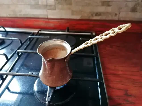 Briki coffee maker on stove