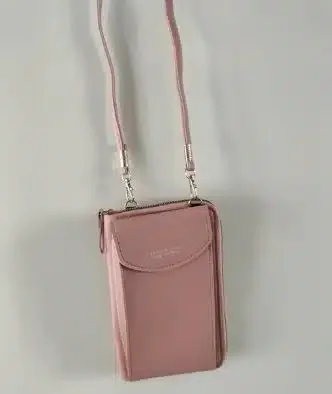 A pink phone cover with a strap