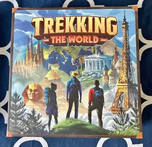The packaging of the board game called Trekking The World