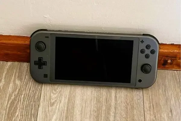 A black Nintendo Switch Lite