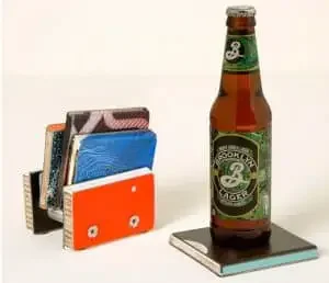 Coasters made from an old ski with a bottle of beer on it