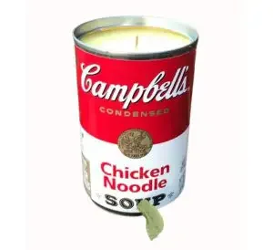 A candle in the tin of Cambells chicken noodle soup