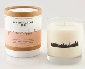 A soy wax candle with the skyline of Washington DC