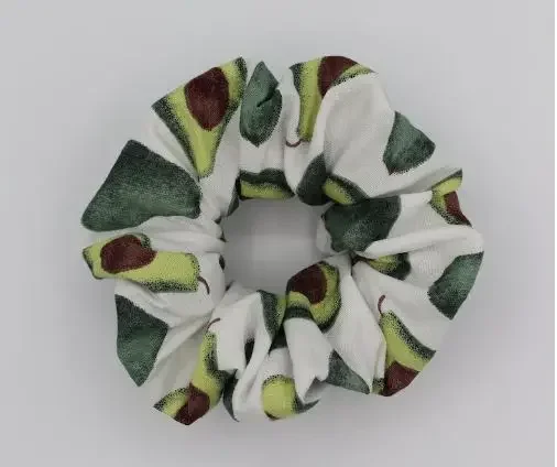 A scrunchie with a print of avocados
