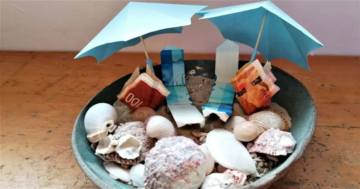 Beach origami money scene