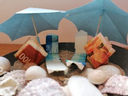 Beach scene made from money origami