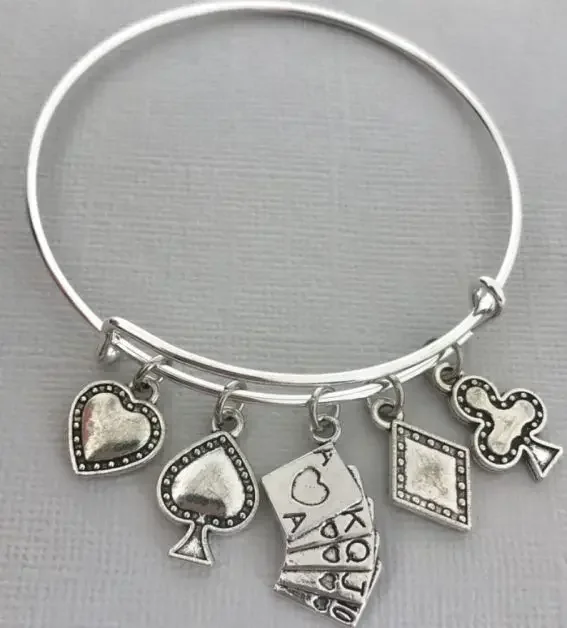 Bracelets with charms of all card suits
