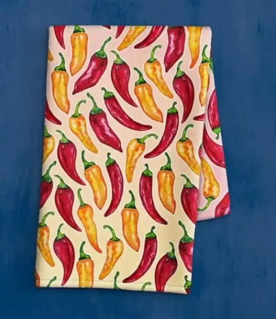 A tea towel with chilies