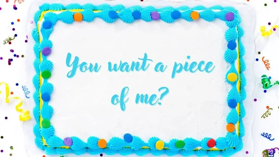 A birthday cake with text; You want a piece of me?