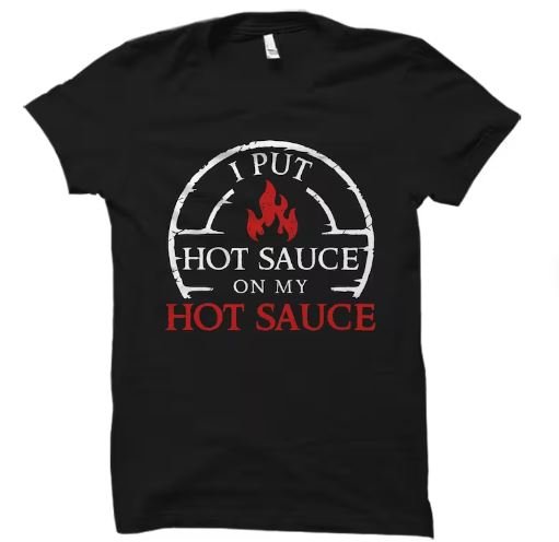 Black shirt with "I put hot sauce on my hot sauce"