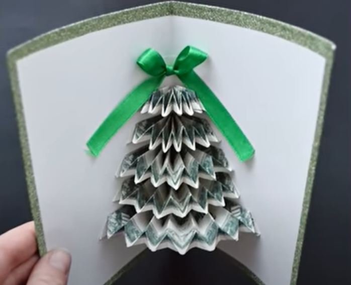 Christmas card with a pop up Christmas tree made from money
