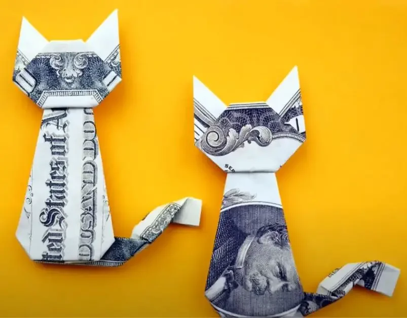 Origami cats made from cash