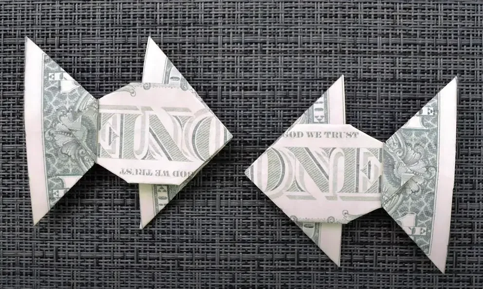 Two fish origami from money