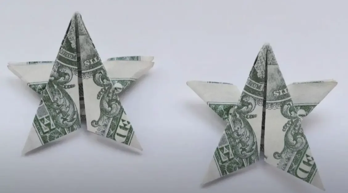 Two stars folded from money