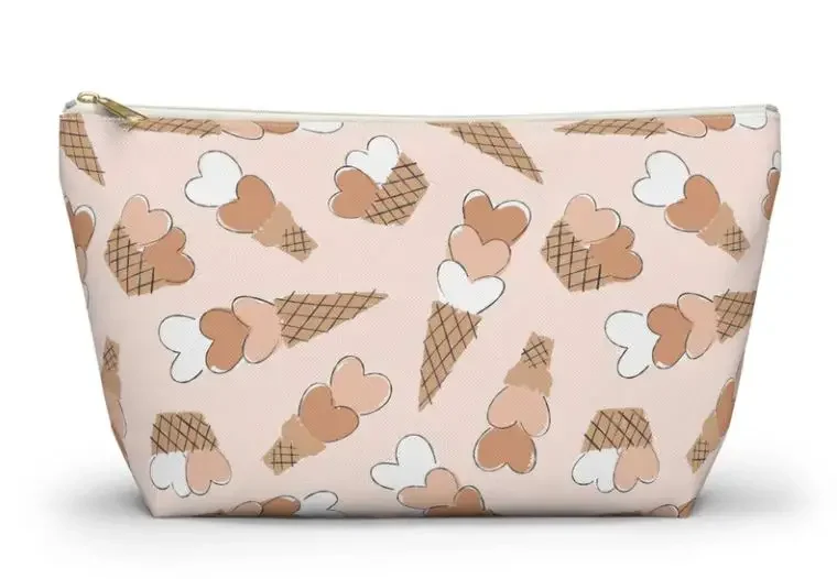 A make up bag with a print of ice creams
