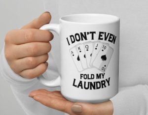 A white coffee mug with "I don't even fold my laundry"