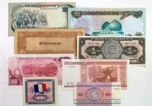 A collections of colorful cash from different countries