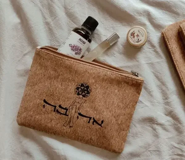 A make-up bag with hebrew letters