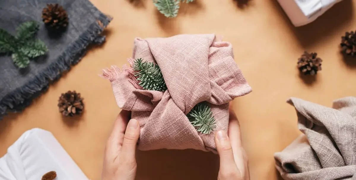eco-friendly gift wrapping in pink cloth