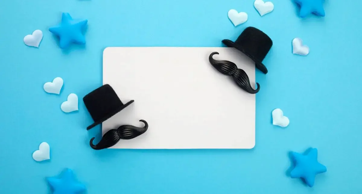 A card with icons of a black hat and moustaches