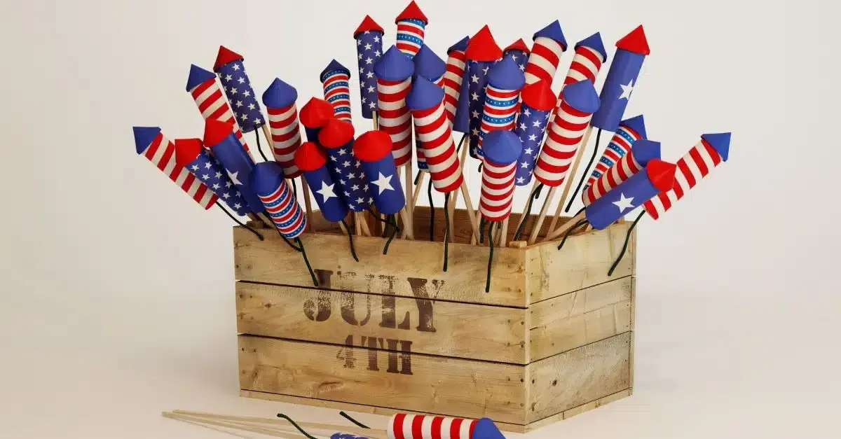 A wooden box with July 4th and firework arrows inside