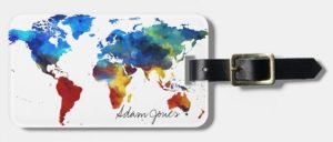 Luggage tag with a name and a colorful print of the map of the world