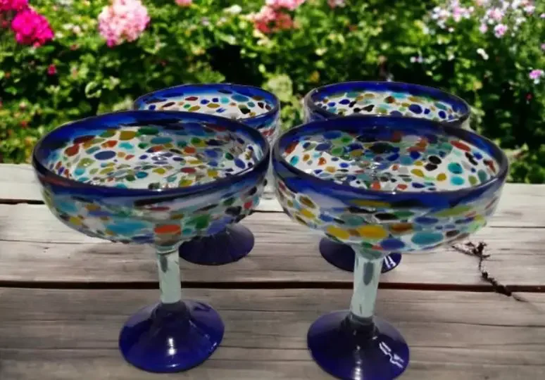 A set of four colorful handblown margarita glasses from Mexico