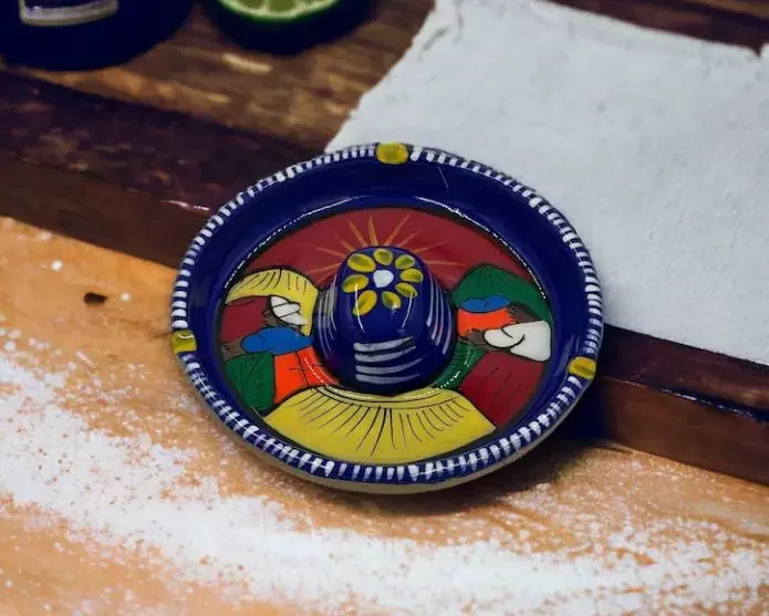 A handmade and colorful margarita glass rimmer from Mexico