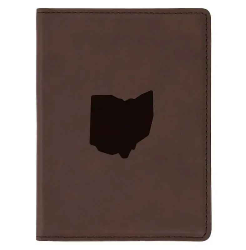 A brown leather passport cover with the map of Ohio
