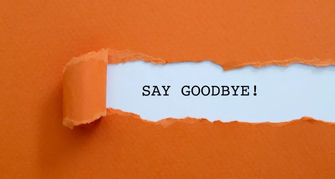 Torn paper with the text Say goodbye!