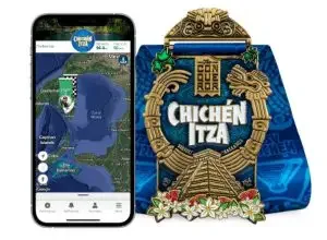A photo of an app on a phone and a medal of Chichen Itza
