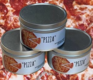 Three candles in boxes that smell like pizza