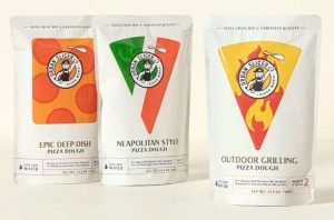 Three packages of mix for pizza dough