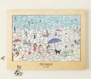 A wooden jigsaw puzzle with a family at the beach