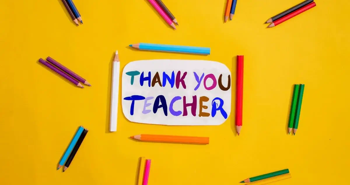 Coloring pencils and a note saying "Thank you teacher"
