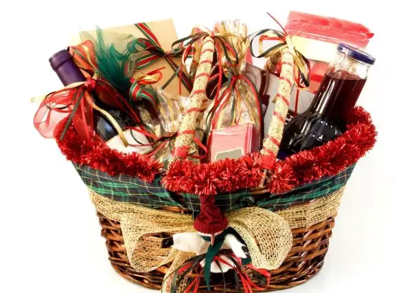 A Christmas basket with food and Christmas ornament